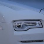 White Rolls-Royce Ghost II headlights closeup