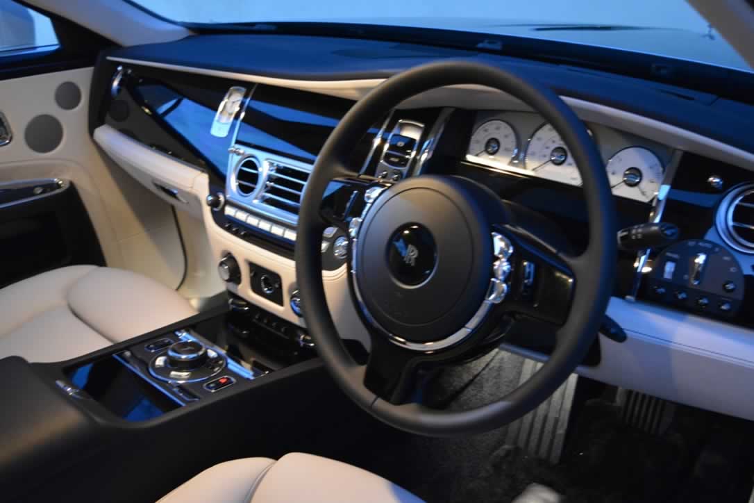 White Rolls-Royce Ghost II interiro dashboard with steering wheel