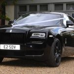 Rolls-Royce Ghost Series II front with wedding ribbons on bonnet