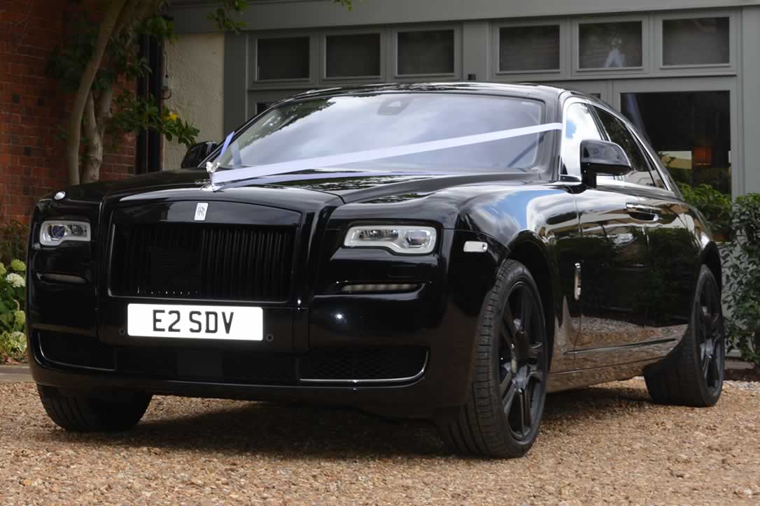 Rolls-Royce Ghost Series II front with wedding ribbons on bonnet
