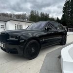 Black Rolls-Royce Cullinan passenger side