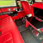 Black Rolls-Royce Cullinan red interior rear seating and drop down TV screens
