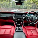Black Rolls-Royce Cullinan front read leather seating and dasdhboard