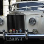 Rolls-Royce Silver Cloud with wedding ribbons on the bonnet