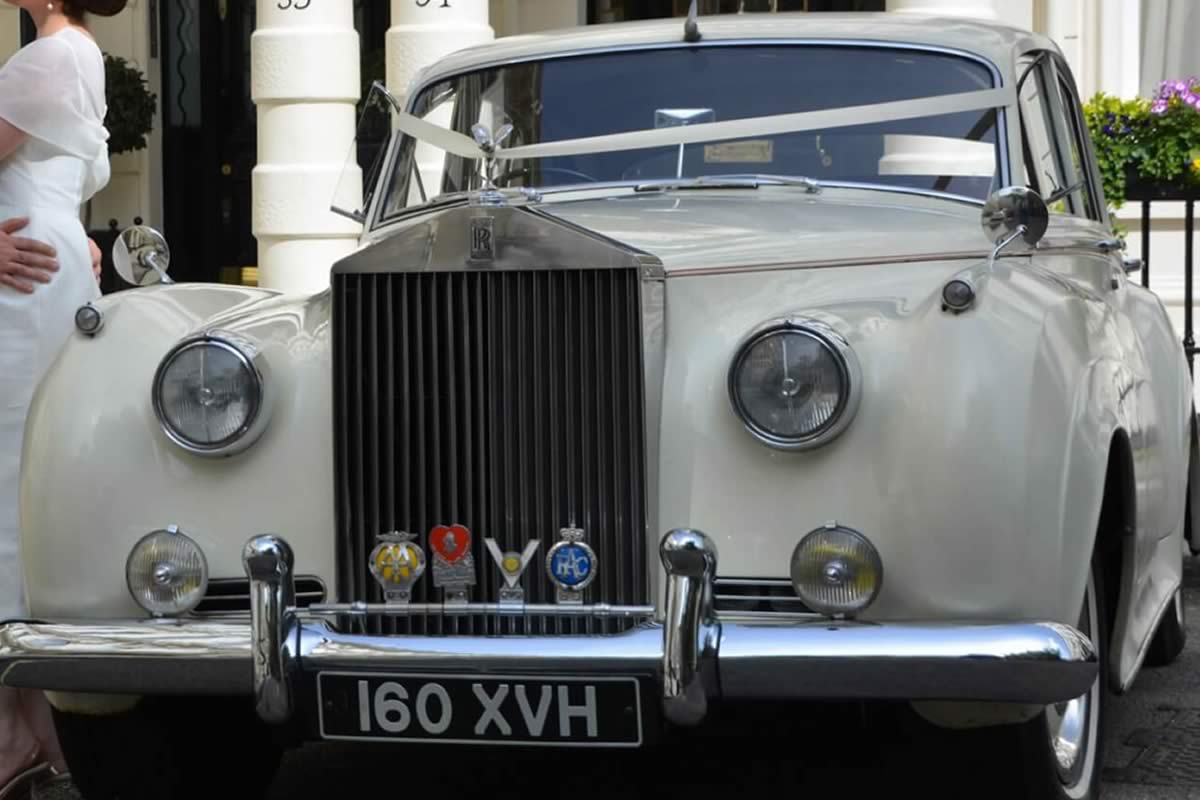 RollsRoyce Phantom Silver Cloud with wedding ribbons