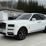 White Rolls-Royce Cullinan 3/4 front passenger side view