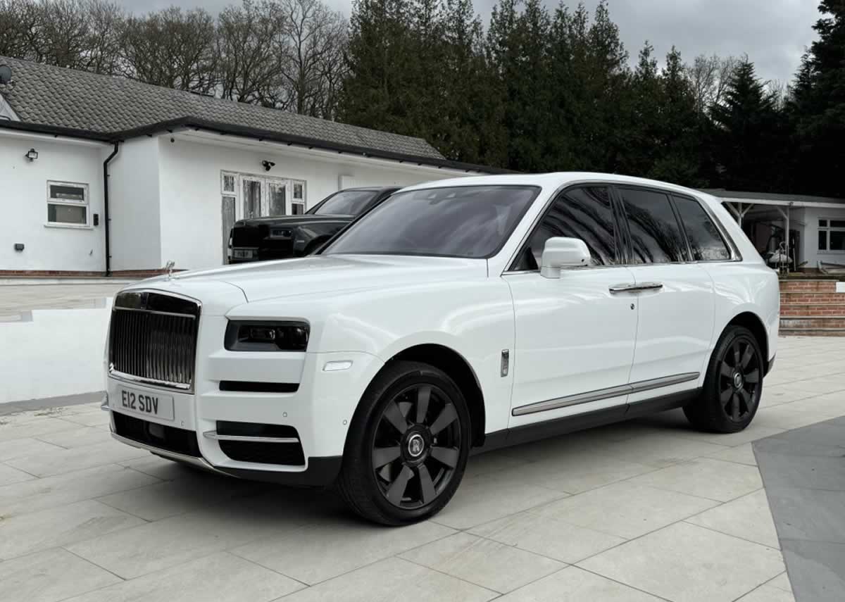 White Rolls-Royce Cullinan 3/4 front passenger side view