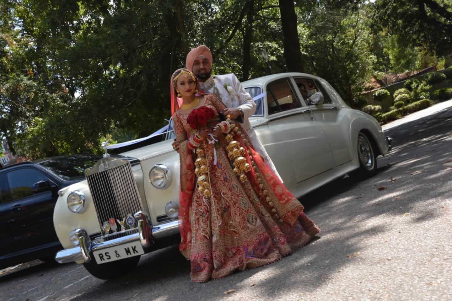 Rolls-Royce Silver Cloud classic wedding car and Indian wedding couple